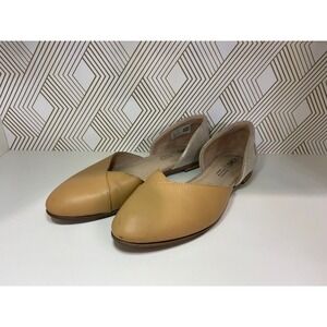 TOMS Women's tan slip on‎ shoes.